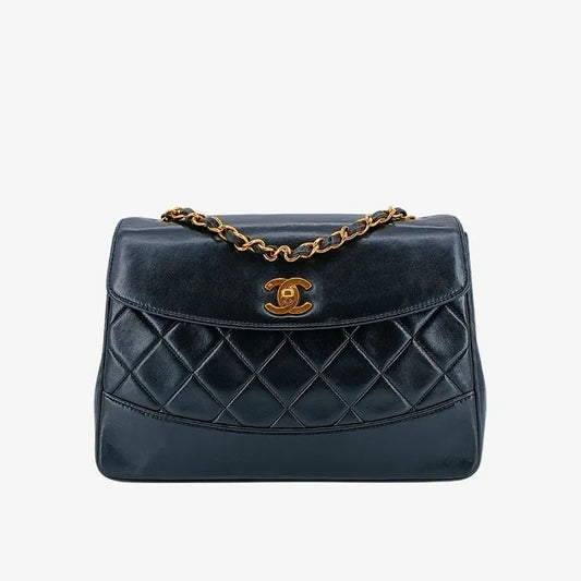90227492-chanel-vintage-black-lambskin-trapezoid-flap-bag
