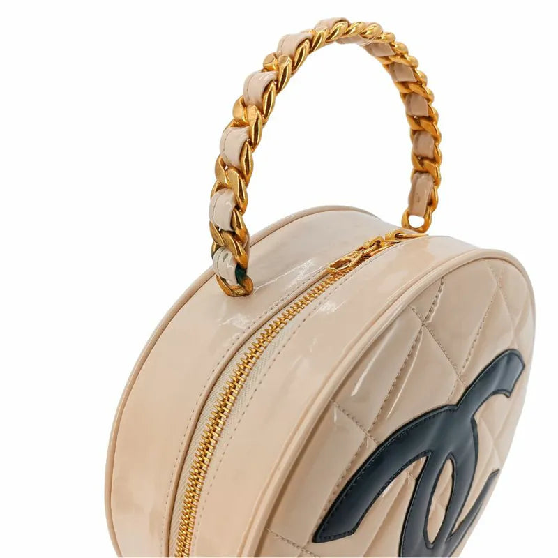 sh022-chanel-vintage-beige-patent-leather-round-vanity-handbag