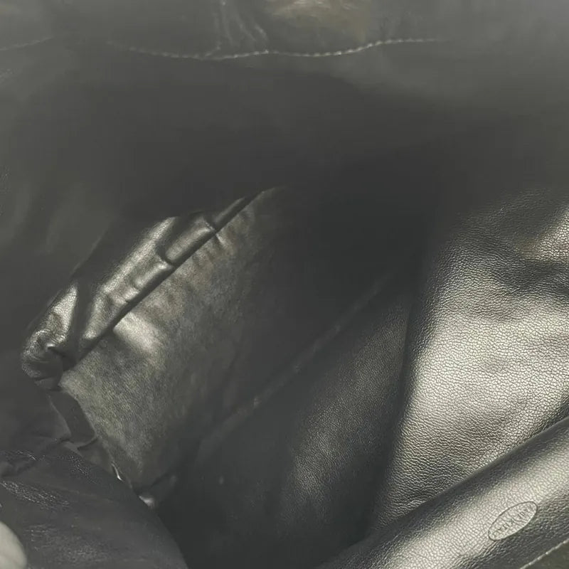 jw571-chanel-vintage-black-lambskin-drawstring-backpack