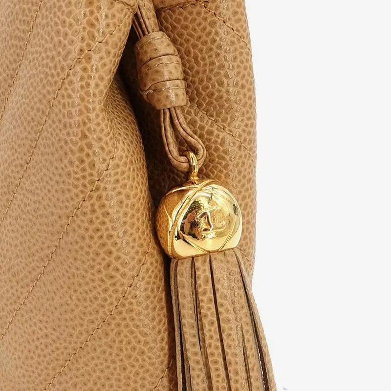 jr876-chanel-vintage-beige-caviar-leather-handbag