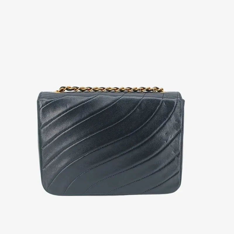 jt341-chanel-vingate-black-lambskin-spiral-flap-bag