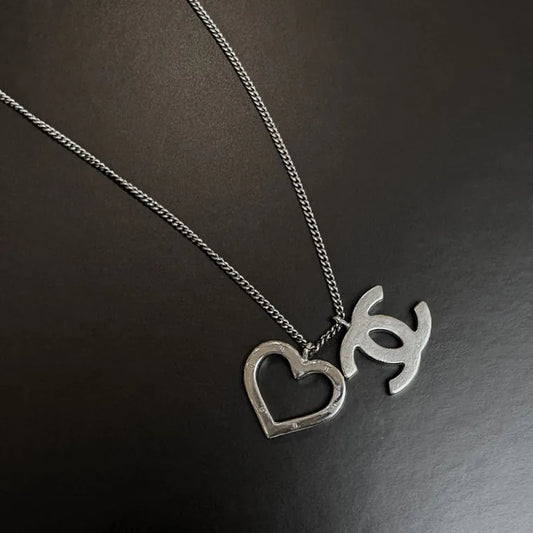 RC705 - CHANEL Vintage Silver Brass CC Open Heart Pendant