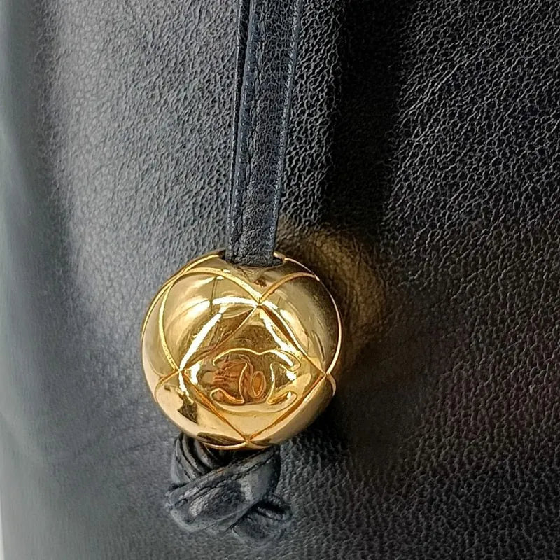 jah161-chanel-vintage-black-lambskin-embossed-logo-tote-bag