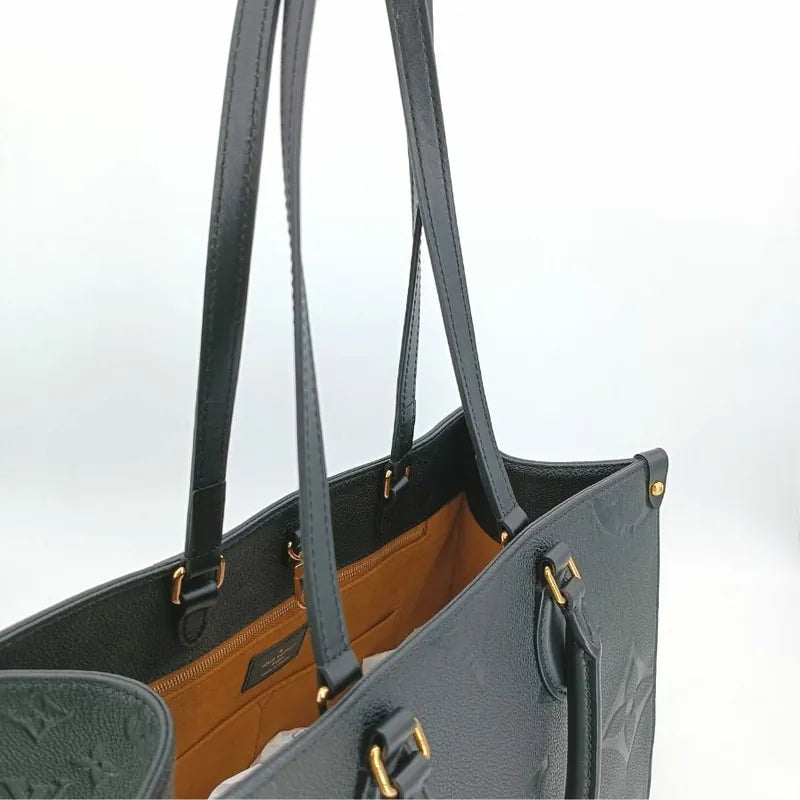 js540-louis-vuitton-onthego-monogram-empreinte-mm