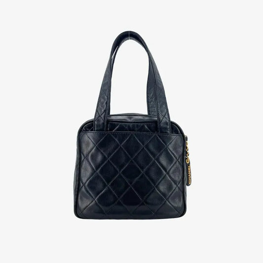jx726-chanel-vintage-black-lambskin-quilted-handbag