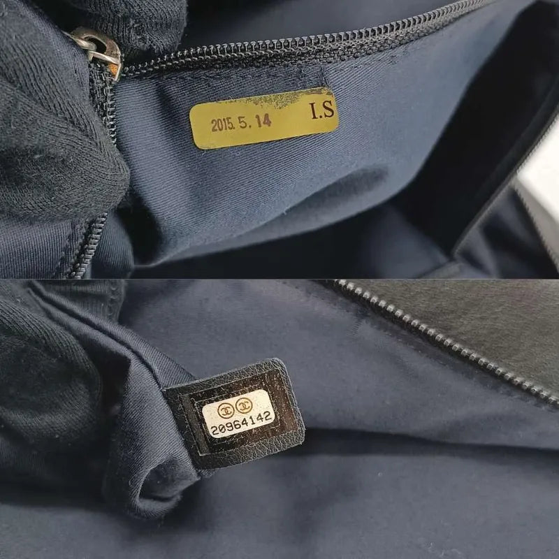 90202460-chanel-vintage-black-lambskin-girl-shoulder-bag