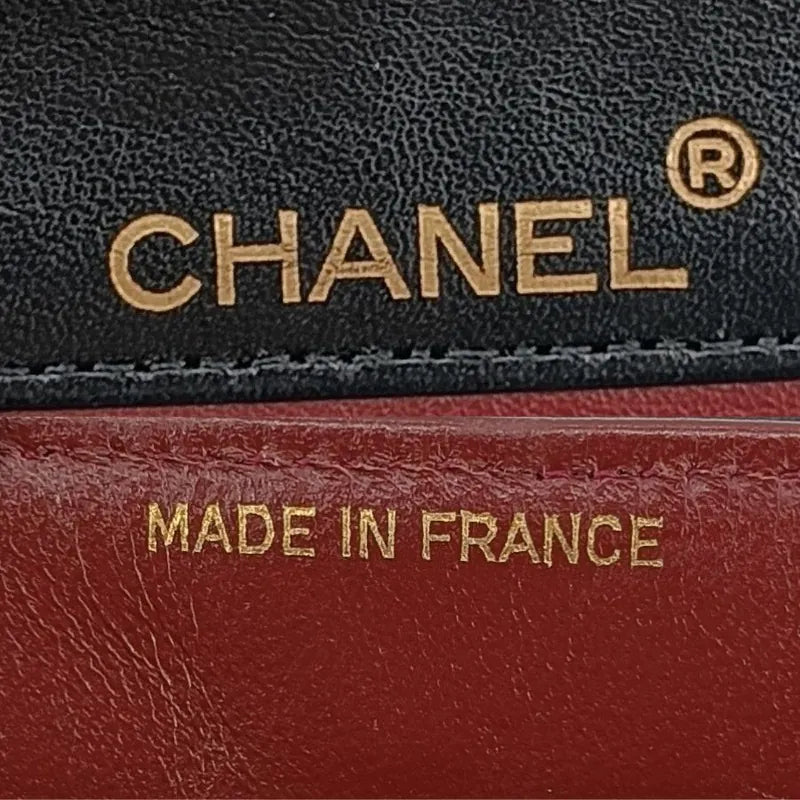 ra104-chanel-vintage-black-lambskin-pointed-flap-bag