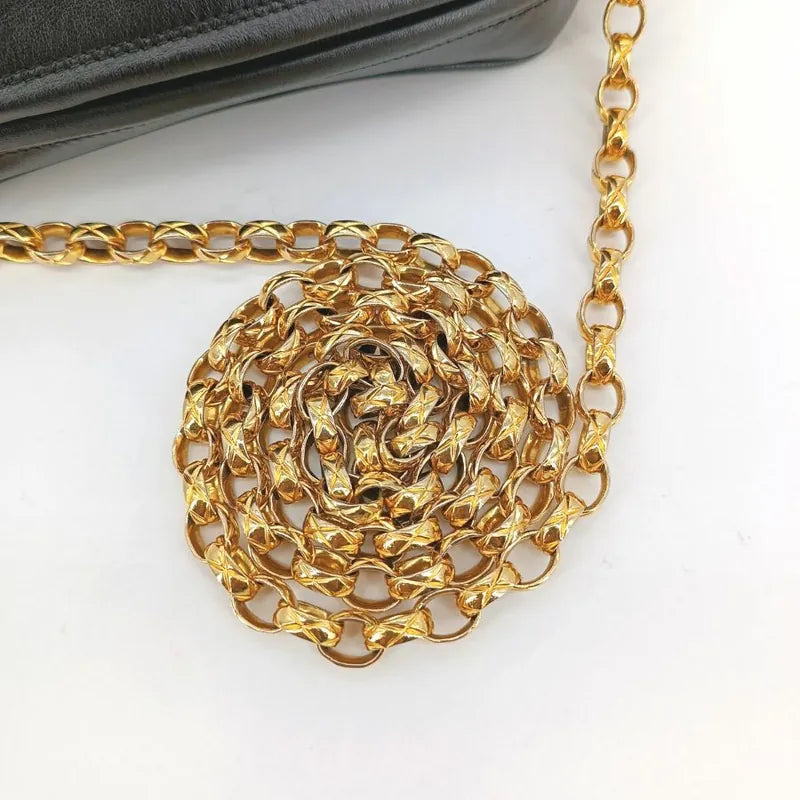 ra642-chanel-vintage-black-lambskin-tassels-gold-chain-camera-bag