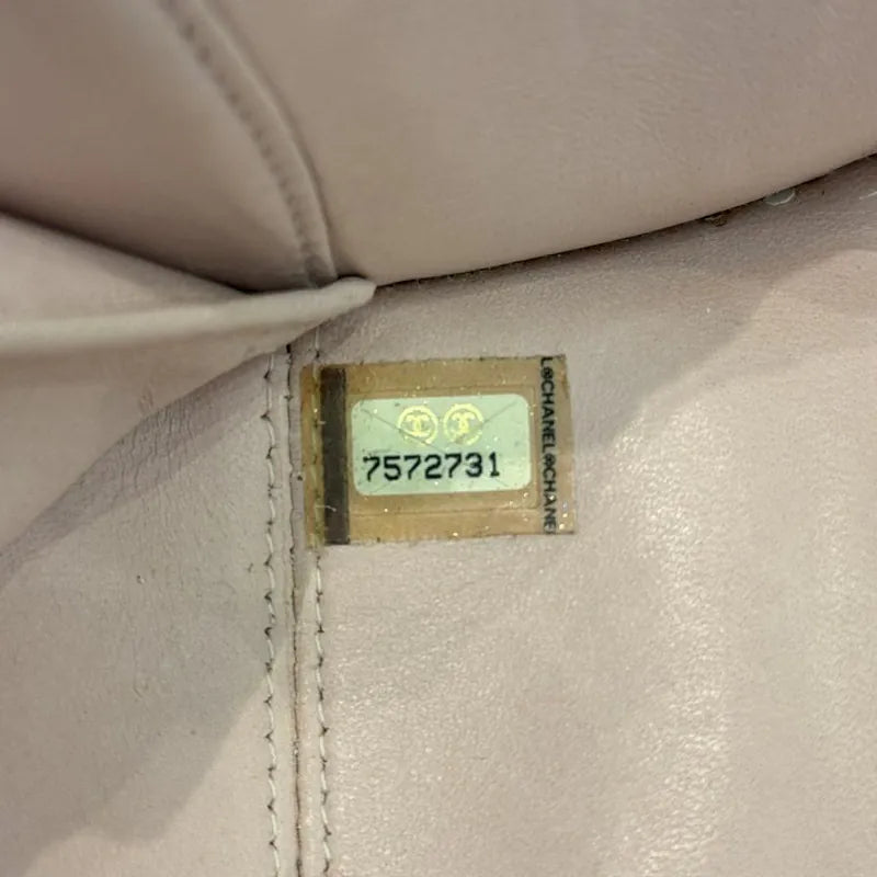 c531-chanel-vintage-pale-pink-calfskin-camellia-wristlet-evening-bag