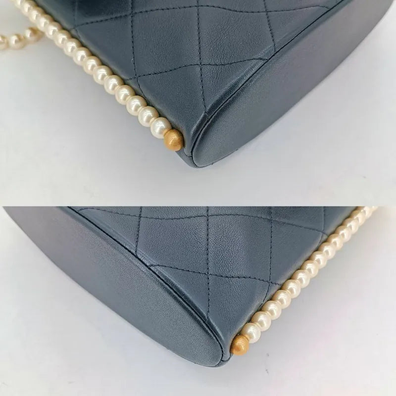 c482-chanel-black-calfskin-imitation-pearls-flap-bag