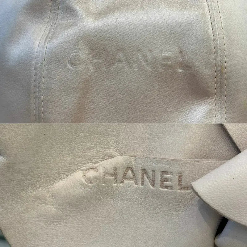 c531-chanel-vintage-pale-pink-calfskin-camellia-wristlet-evening-bag