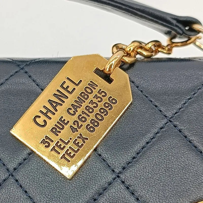 ra293-chanel-vintage-navy-lambskin-double-turnlock-flap-bag