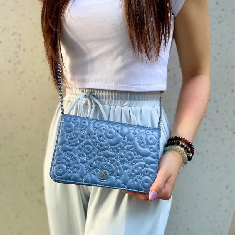 c484-chanel-light-blue-calfskin-camellia-studded-wallet-on-chain