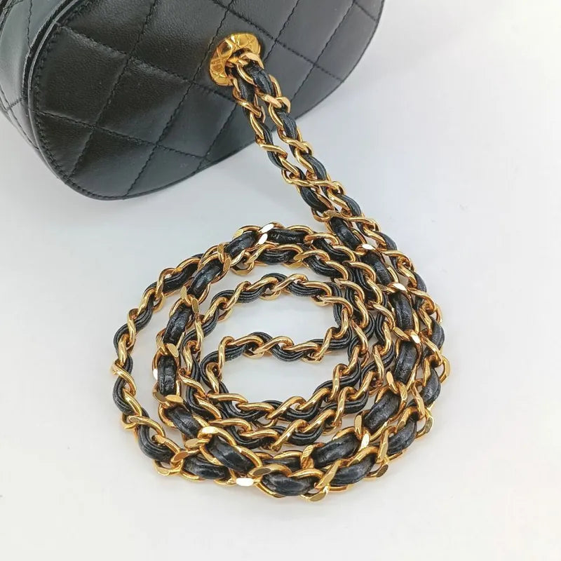 ra253-chanel-vintage-black-lambskin-tassel-bucket-bag