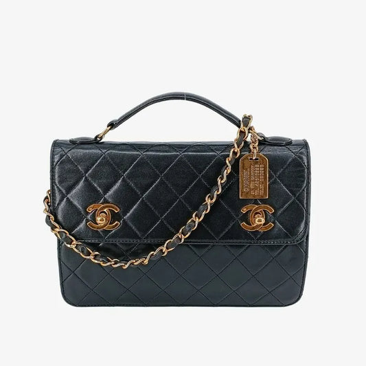 jah83-chanel-vintage-black-lambskin-double-turnlock-flap-bag