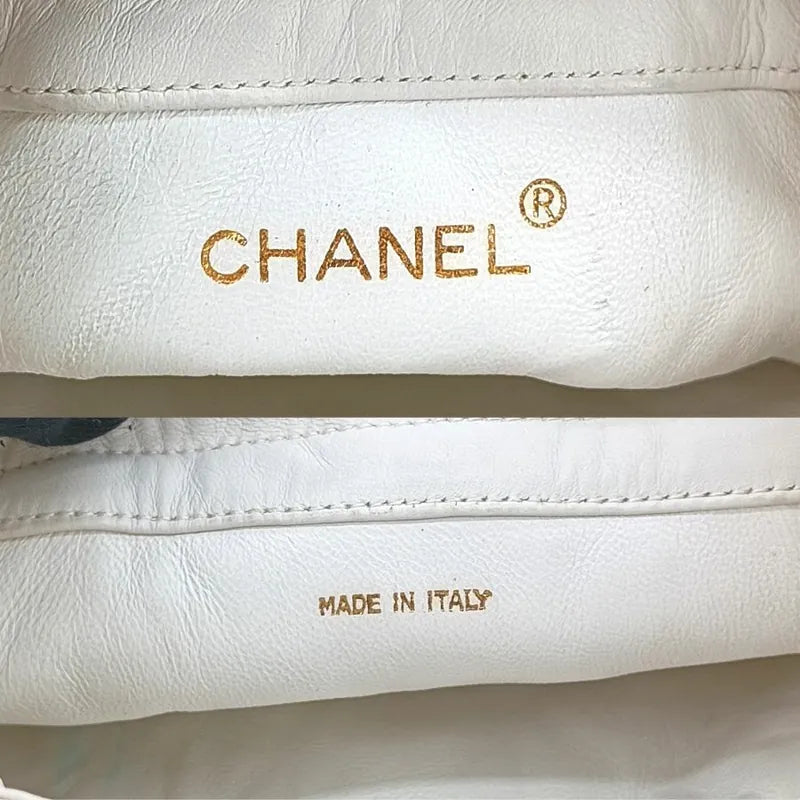 jt382-chanel-vintage-white-lambskin-drawstring-bucket-bag