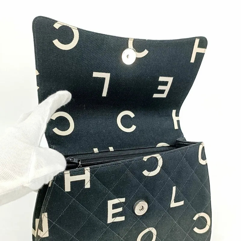 js535-chanel-vintage-black-cotton-handbag