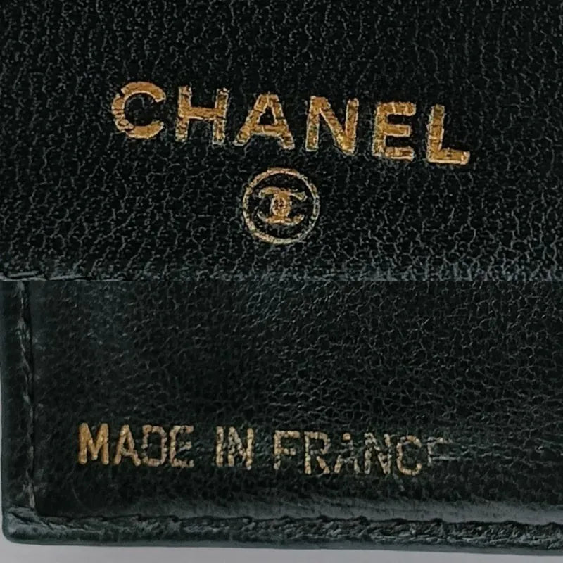 ju280-chanel-vintage-dark-green-caviar-leather-bifold-wallet
