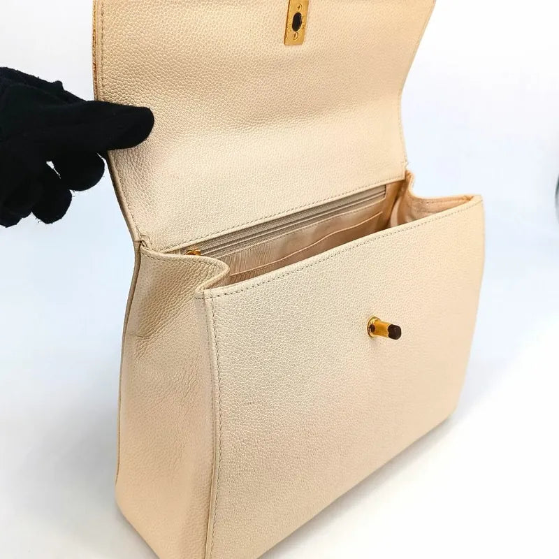 90198834-chanel-vintage-white-caviar-leather-wood-top-handle-bag