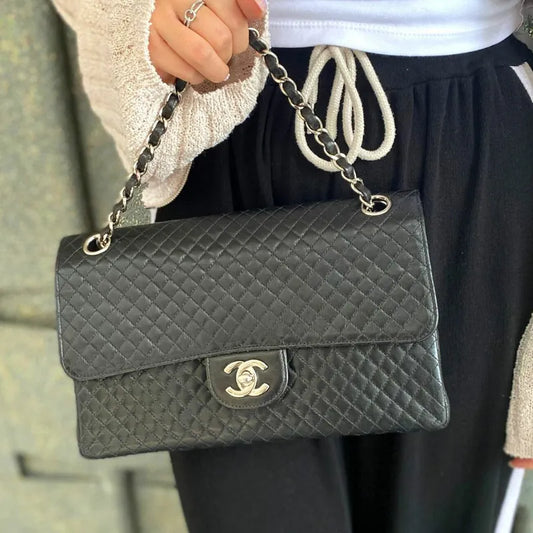 90201267-chanel-vintage-black-lambskin-quilted-flap-bag