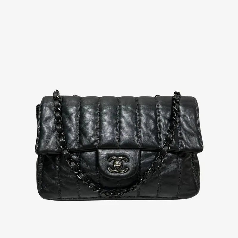 90249877-chanel-black-lambskin-vertical-stitch-flap-bag