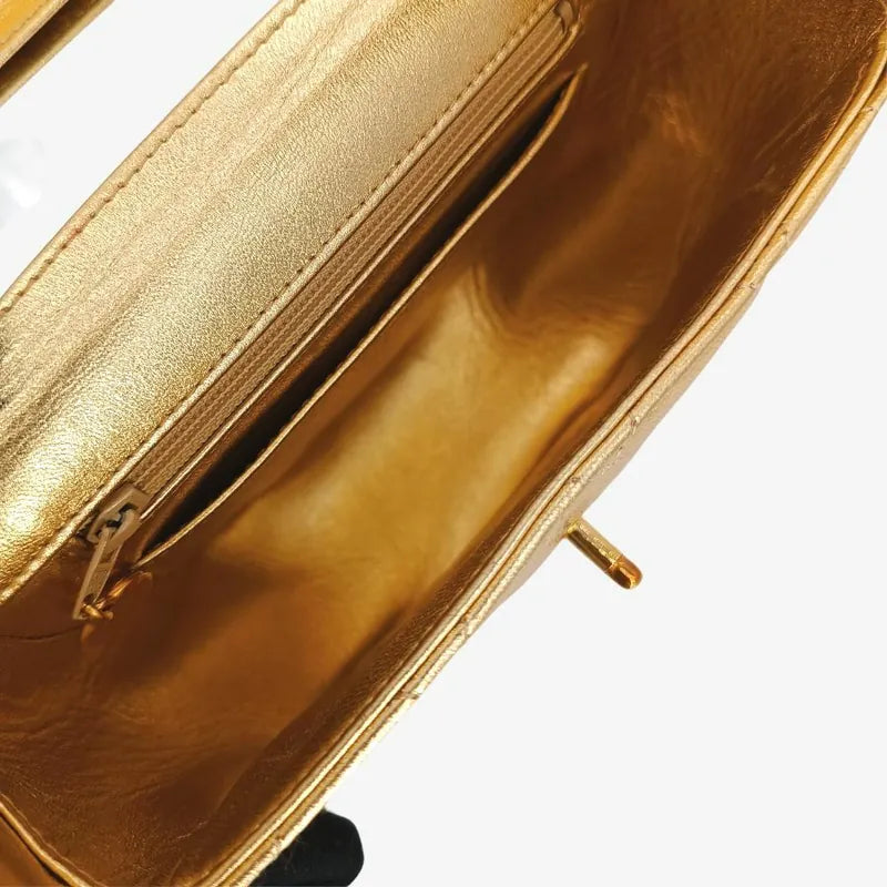 c386-chanel-vintage-gold-lambskin-quilted-handbag