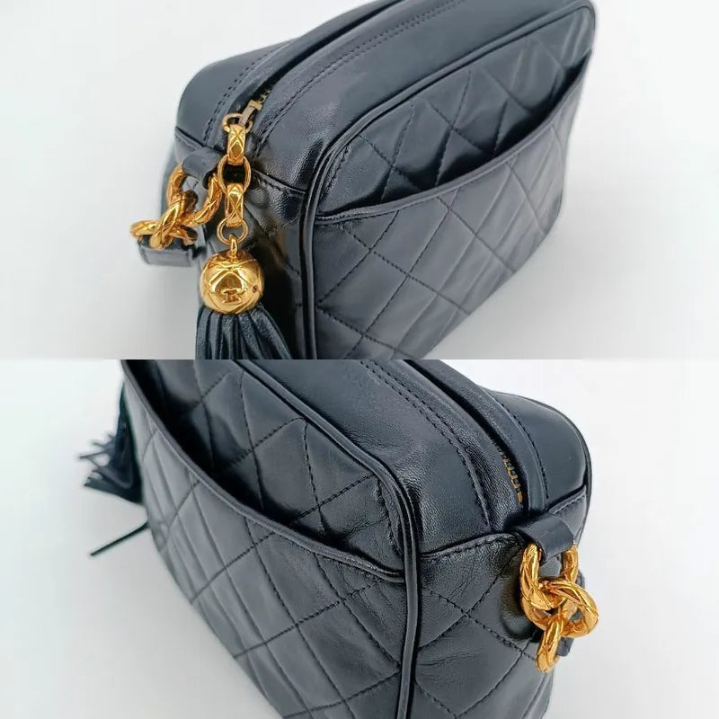 js491-chanel-vintage-black-lambskin-quilted-tassels-camera-bag
