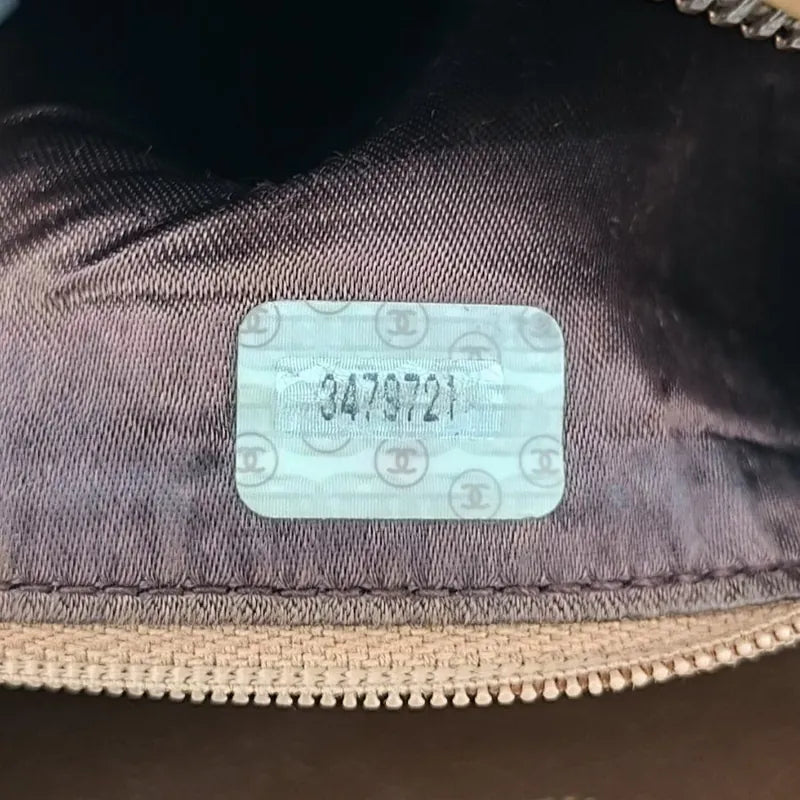 jah173-chanel-vintage-beige-lambskin-tassel-camera-bag