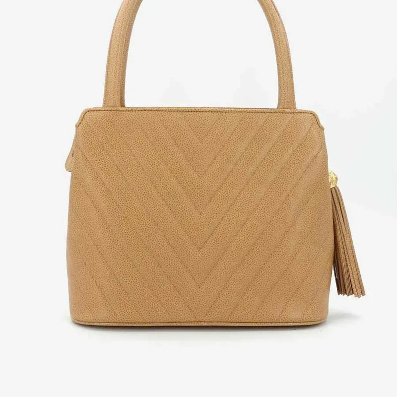 jr876-chanel-vintage-beige-caviar-leather-handbag