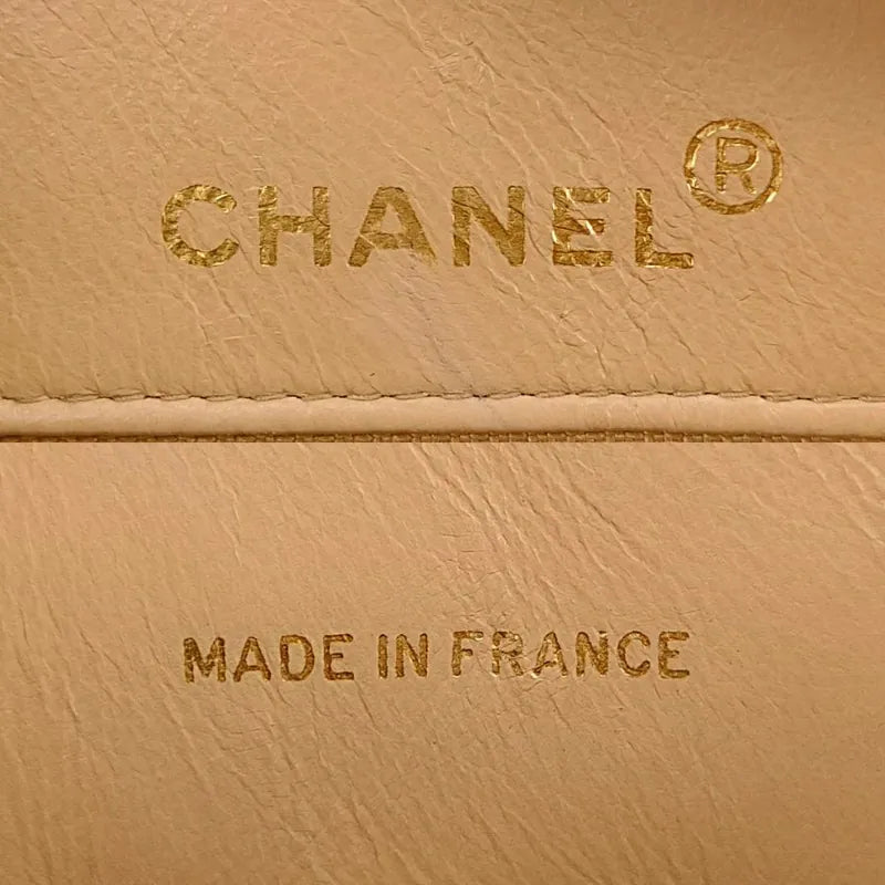 jt620-chanel-vintage-beige-lambskin-gold-chain-camera-bag