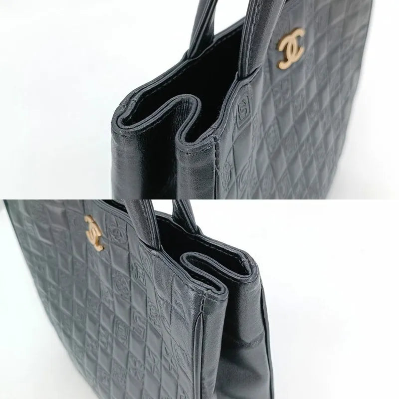 ra372-chanel-vintage-black-lambskin-precious-symbols-embossed-tote-bag
