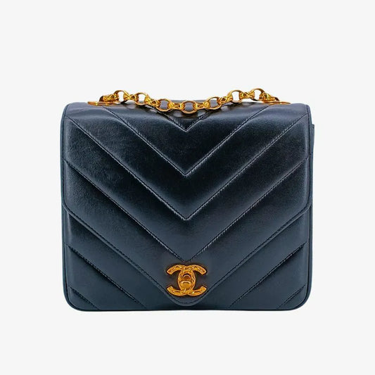 90226793-chanel-vintage-black-lambskin-chevron-flap-bag