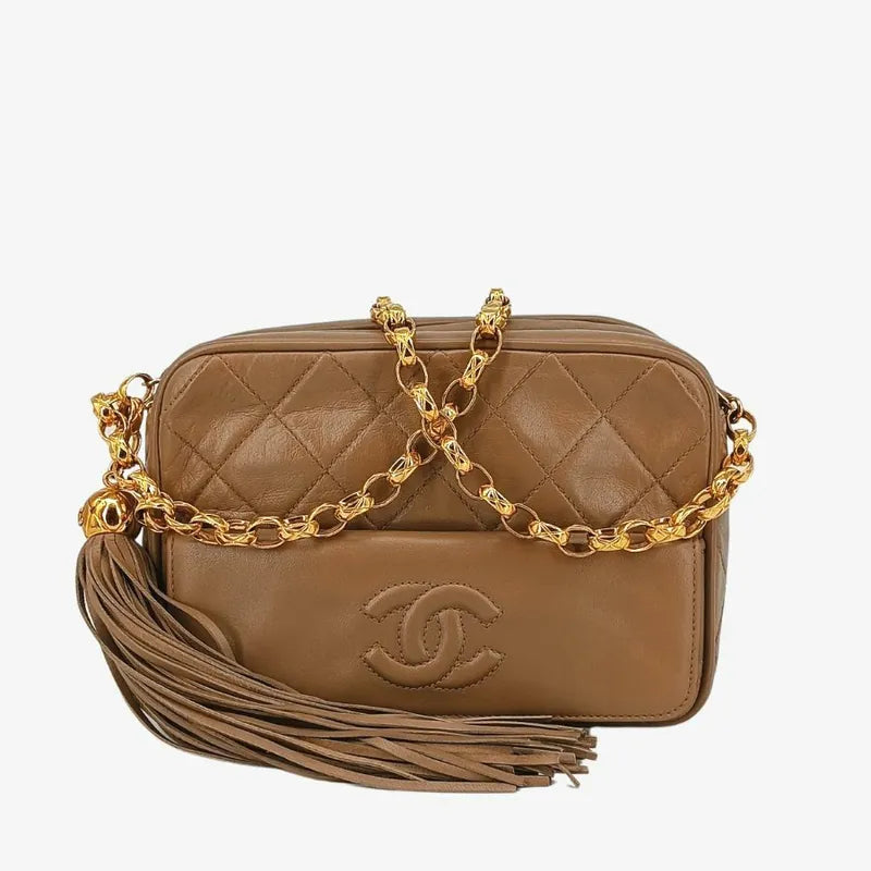 jah109-chanel-vintage-beige-lambskin-tassels-gold-chain-camera-bag