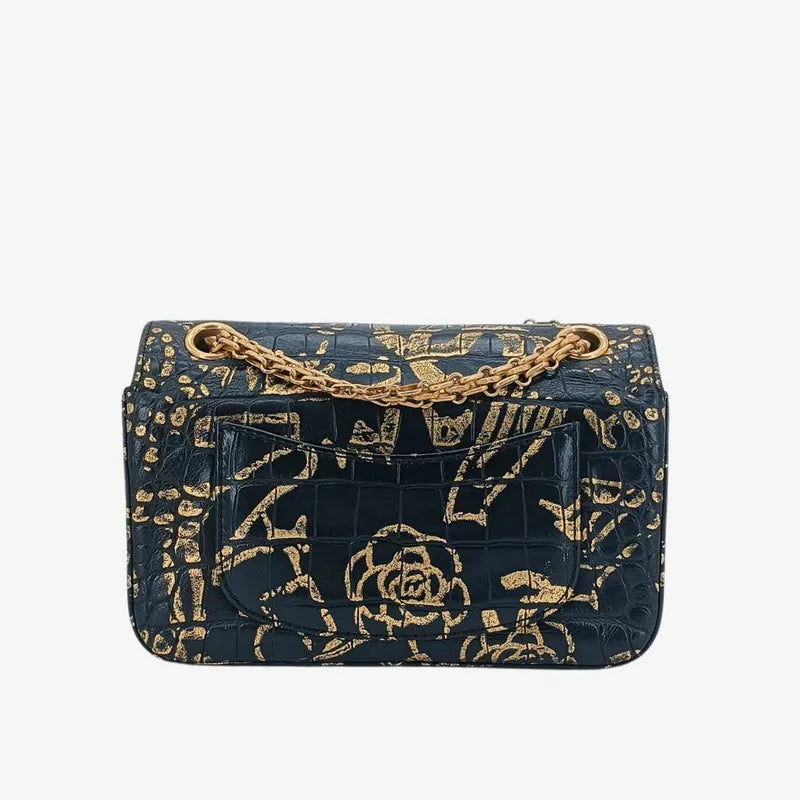 90213845-chanel-black-and-gold-graffiti-calfskin-crocodile-embossed-255-flap-bag
