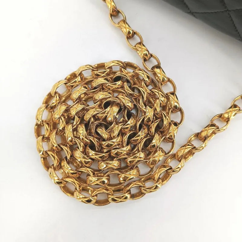 ra438-chanel-vintage-black-lambskin-tassels-gold-chain-camera-bag