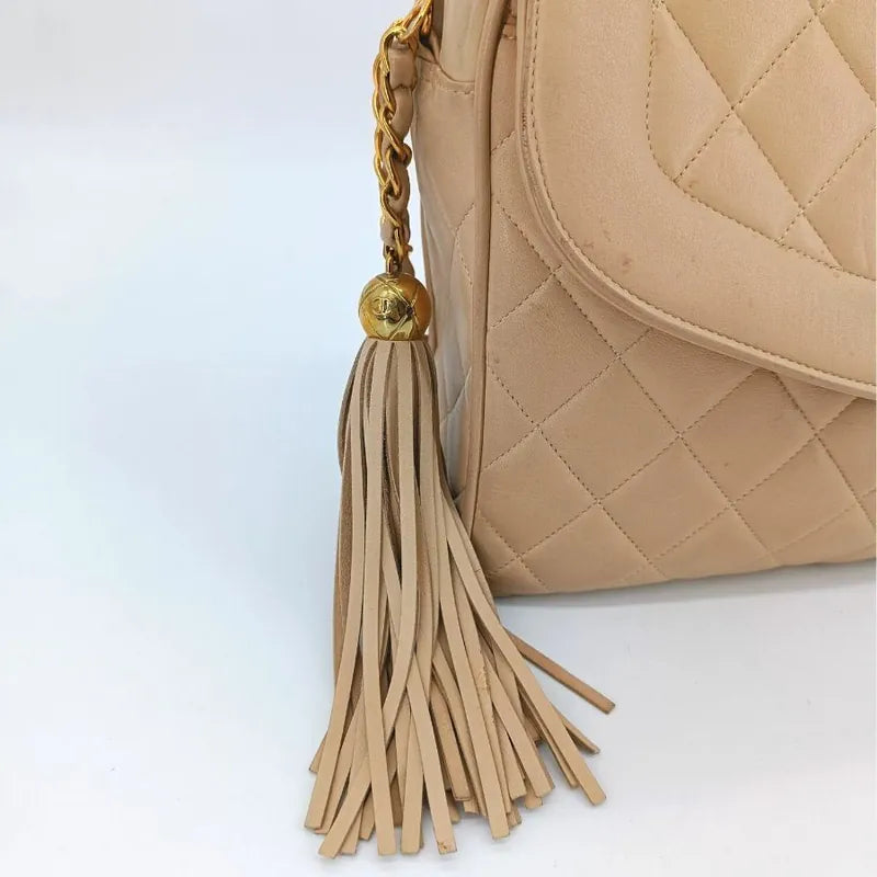 jt181-chanel-vintage-beige-lambskin-tassel-camera-bag