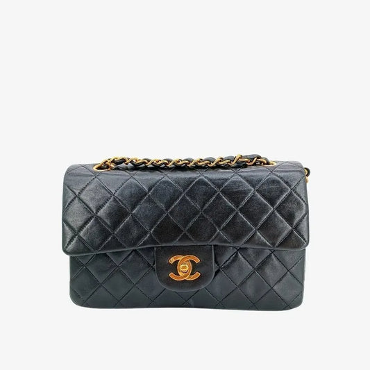 90199860-chanel-vintage-black-lambskin-23cm-classic-flap-bag