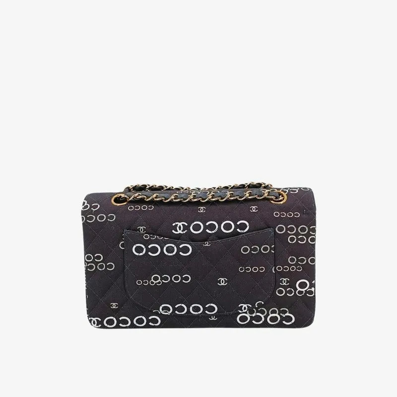 90173728-chanel-vintage-black-canvas-coco-print-flap-bag