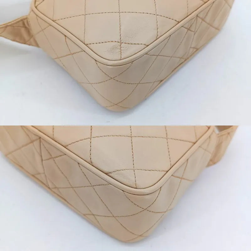 ra862-chanel-vintage-beige-lambskin-tassel-camera-bag