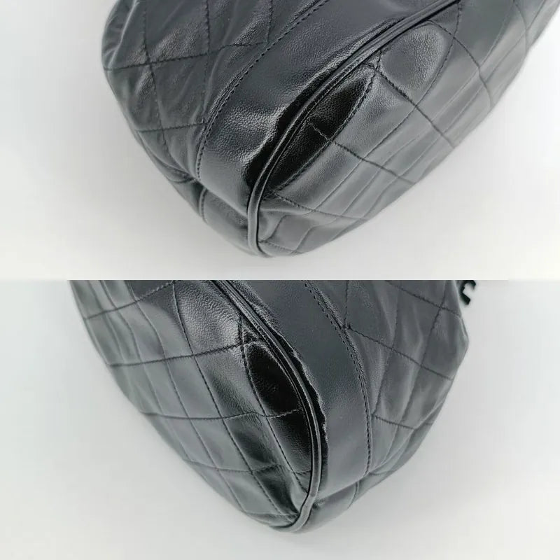 ra586-chanel-vintage-black-lambskin-drawstring-bucket-bag