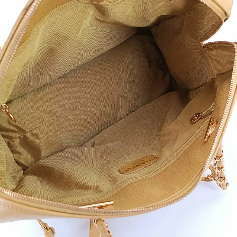js337-chanel-vintage-yellow-caviar-leather-embossed-logo-tote-bag