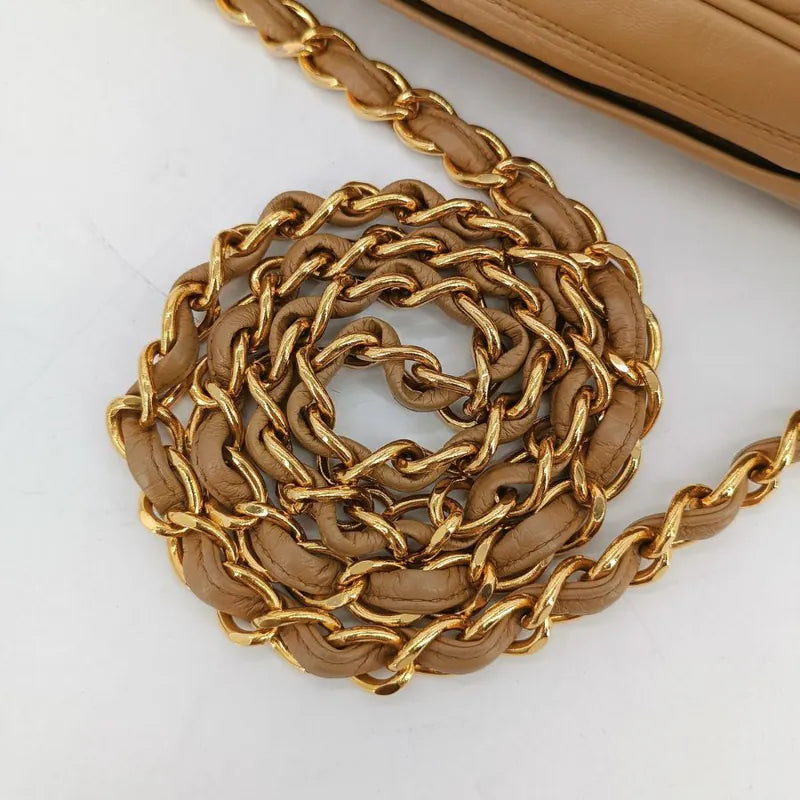 jah173-chanel-vintage-beige-lambskin-tassel-camera-bag