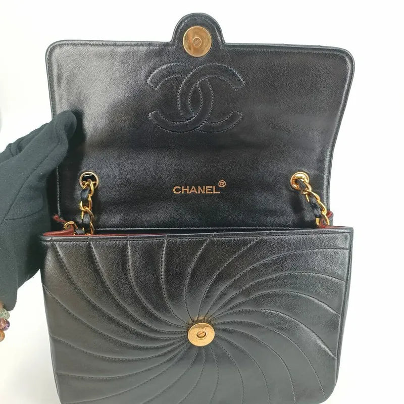 jt341-chanel-vingate-black-lambskin-spiral-flap-bag