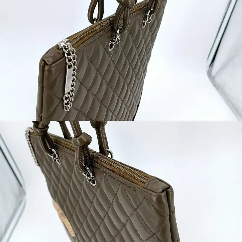 js509-chanel-vintage-olive-green-calfskin-snake-cc-logo-cambon-handbag