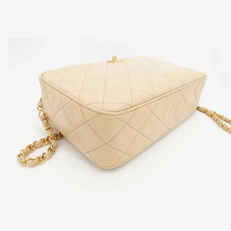 js006-chanel-vintage-beige-lambskin-quilted-camera-bag