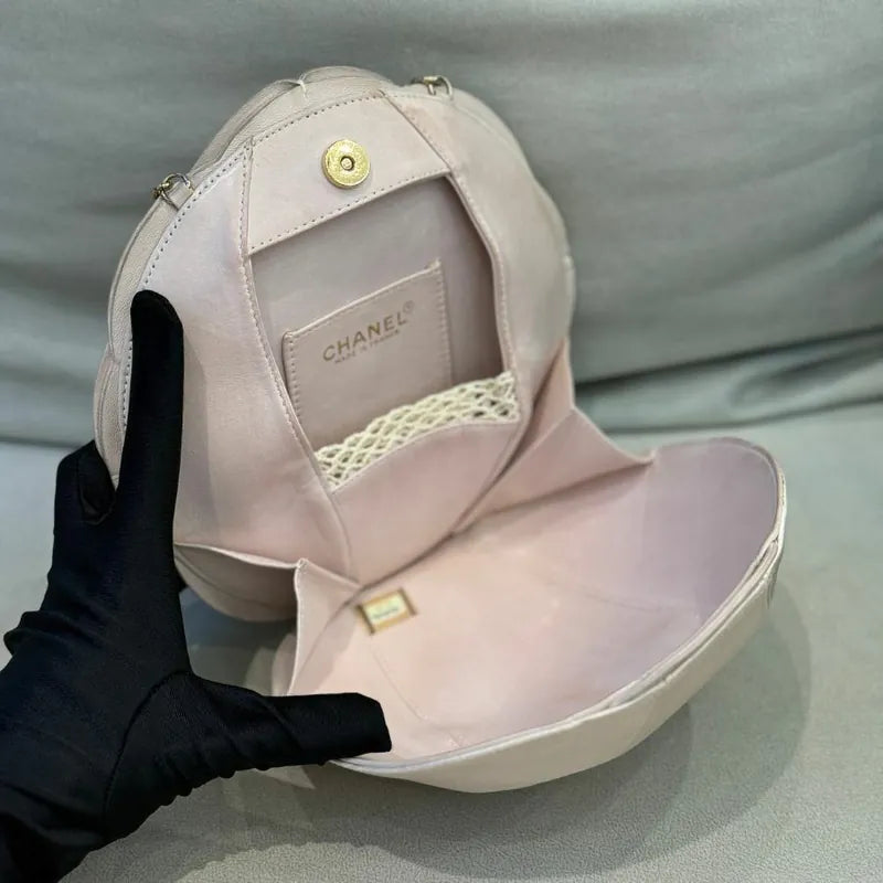 c531-chanel-vintage-pale-pink-calfskin-camellia-wristlet-evening-bag