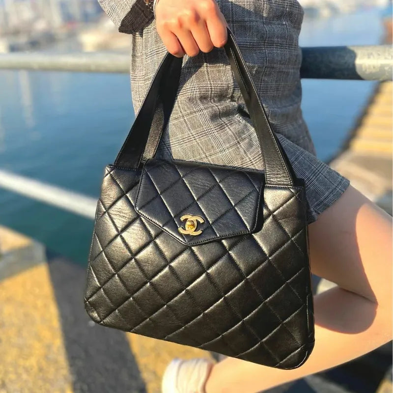 ra294-chanel-vintage-black-lambskin-quilted-handbag