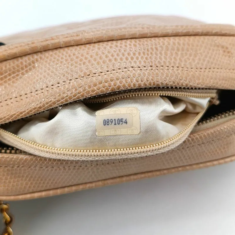 jah164-chanel-vintage-pink-lizard-skin-tassel-camera-bag