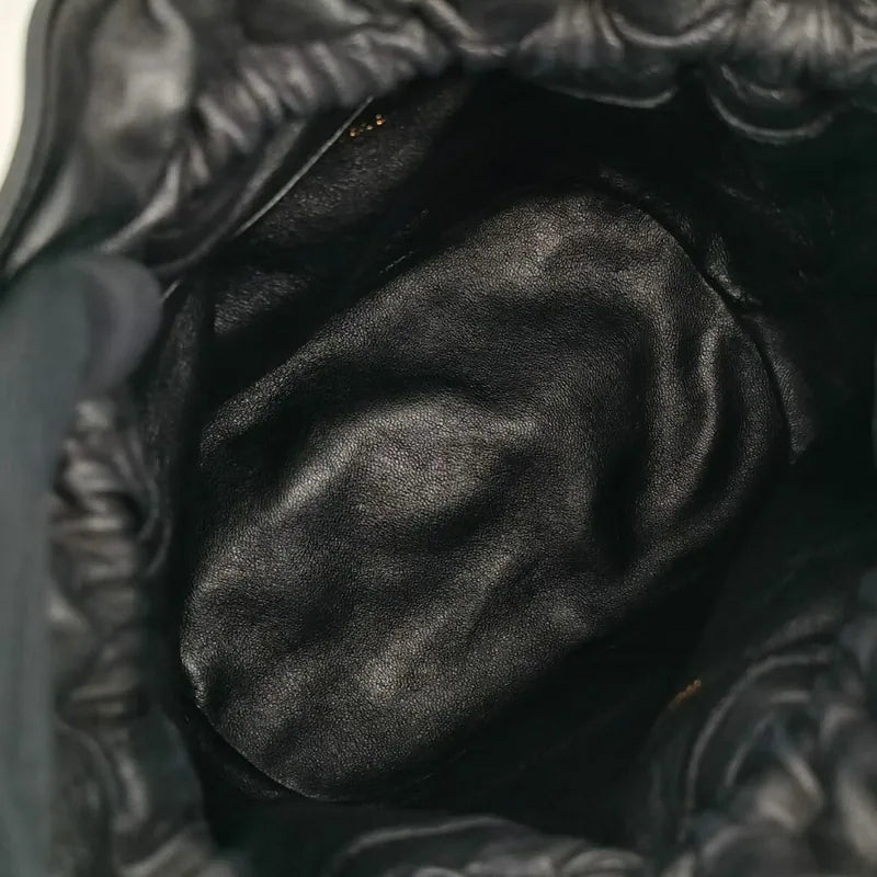 ra586-chanel-vintage-black-lambskin-drawstring-bucket-bag