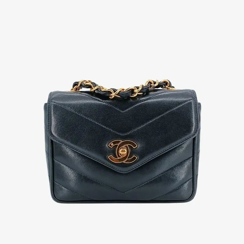 c407-chanel-vintage-navy-lambskin-chevron-mini-flap-bag